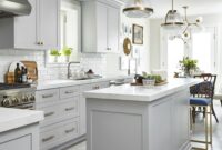 Light Grey Kitchen with celestial chandelier over the kitchen