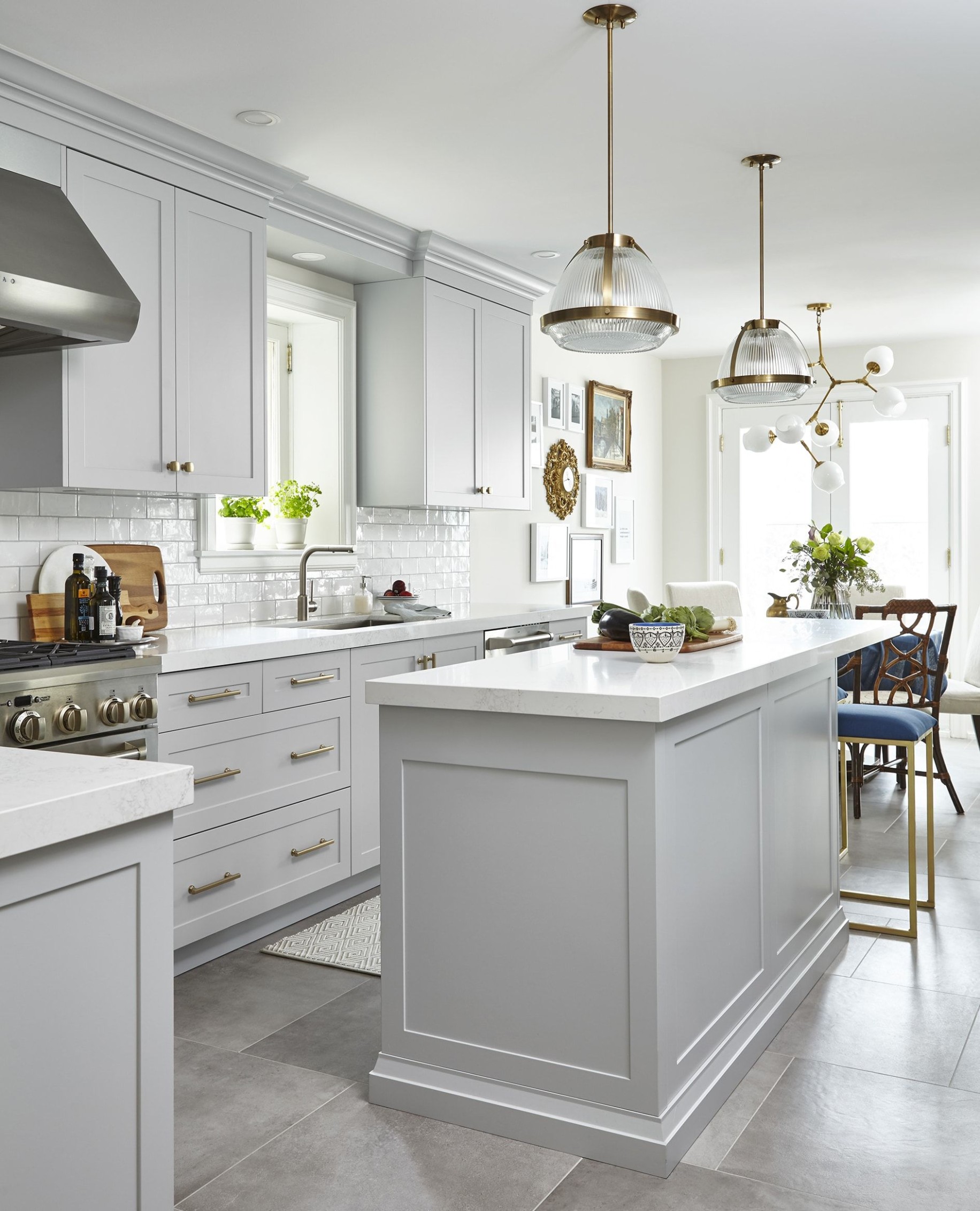 Light Grey Kitchen with celestial chandelier over the kitchen